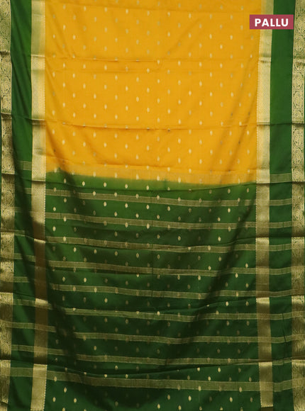 Semi mysore silk saree yellow and light green with allover zari woven buttas and long rettapet zari woven border