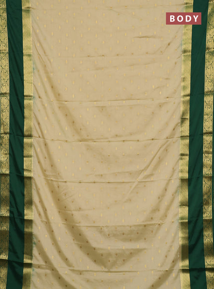 Semi mysore silk saree cream and bottle green with allover zari woven buttas and long rettapet zari woven border