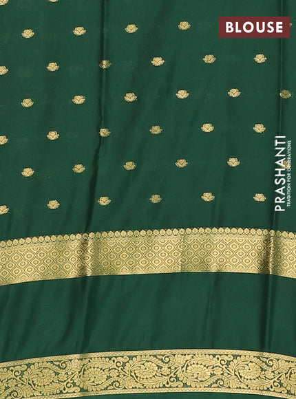 Semi mysore silk saree cream and bottle green with allover zari woven buttas and long rettapet zari woven border