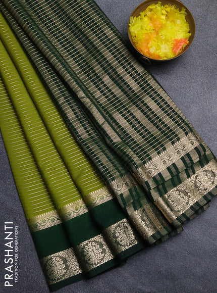 Semi mysore silk saree light green and bottle green with allover zari weaves and rettapet zari woven border