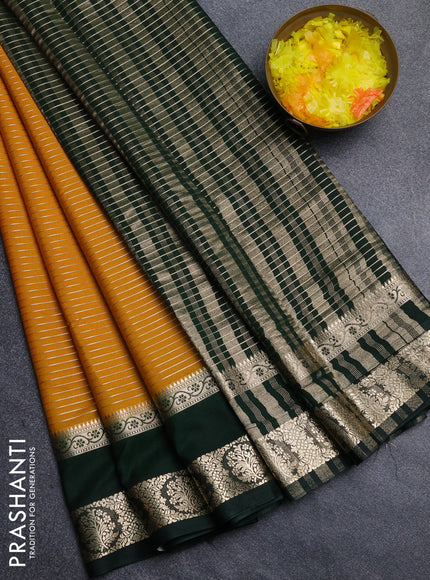 Semi mysore silk saree mustard yellow and bottle green with allover zari weaves and rettapet zari woven border