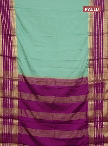 Semi mysore silk saree pastel green with plain body and long zari woven border