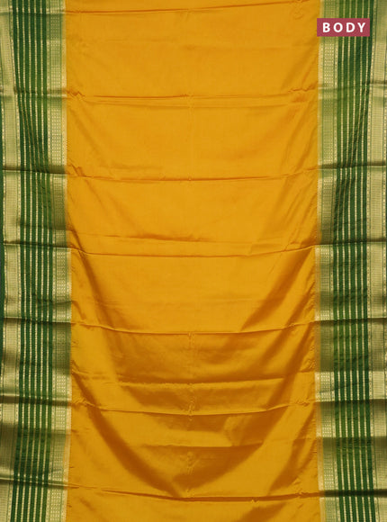 Semi mysore silk saree yellow and green with plain body and long zari woven border