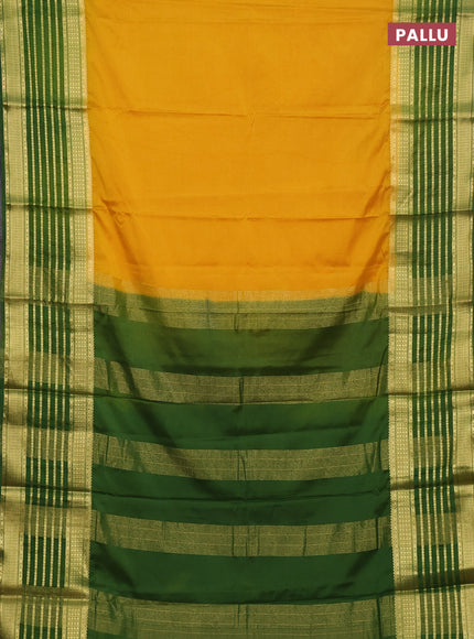 Semi mysore silk saree yellow and green with plain body and long zari woven border