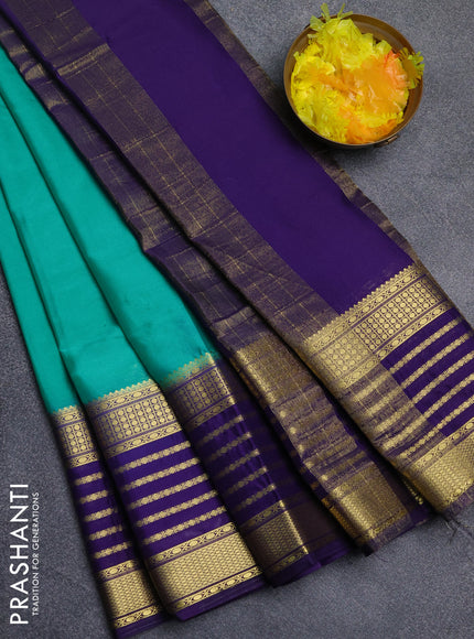 Semi mysore silk saree teal green and navy blue with plain body and long zari woven border