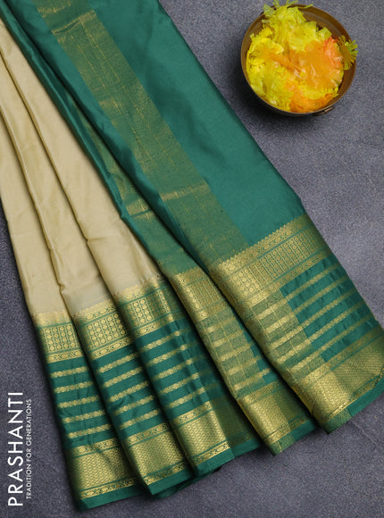 Semi mysore silk saree cream and green with plain body and long zari woven border