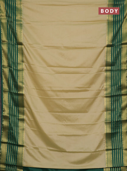 Semi mysore silk saree cream and green with plain body and long zari woven border