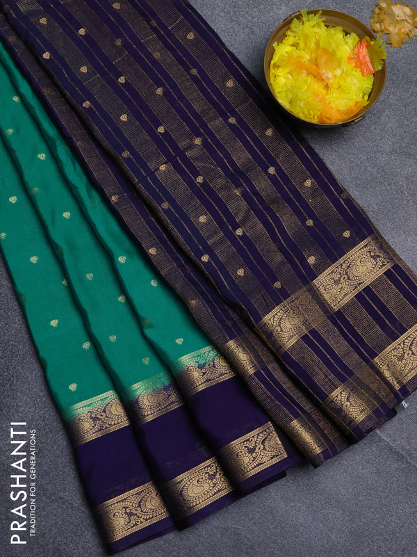 Semi mysore silk saree teal green and navy blue with allover zari woven buttas and rettapet zari woven border