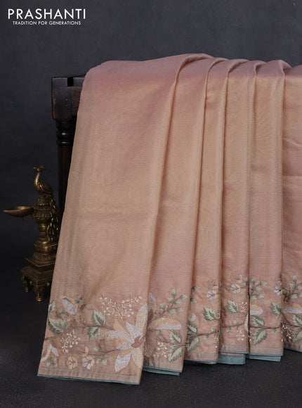 Art tissue saree pastel peach with plain body and embroidery work border
