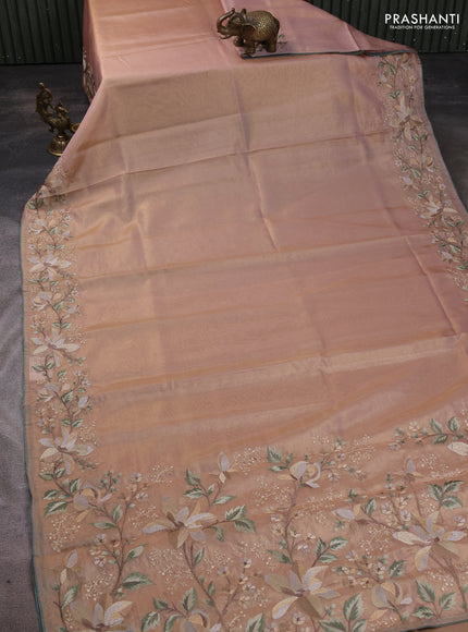Art tissue saree pastel peach with plain body and embroidery work border