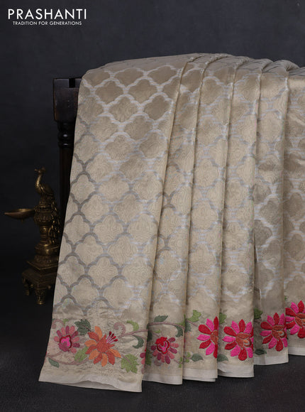 Art tissue saree gold with allover zari woven brocade weaves and embroidery work border