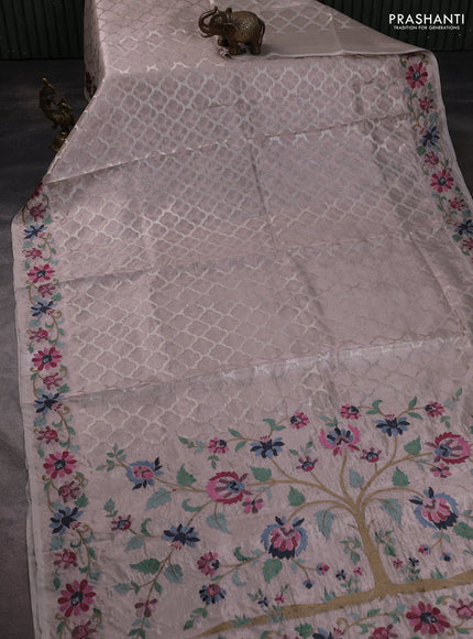 Art tissue saree pastel pink shade with allover zari woven brocade weaves and embroidery work border