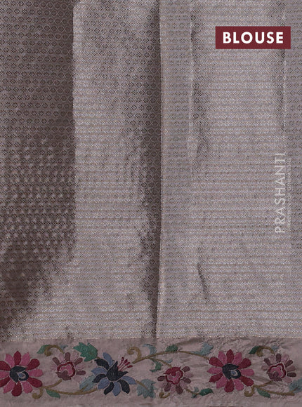 Art tissue saree pastel pink shade with allover zari woven brocade weaves and embroidery work border