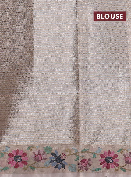 Art tissue saree beige with allover zari woven brocade weaves and embroidery work border