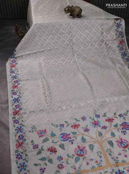 Art tissue saree pastel grey with allover zari woven brocade weaves and embroidery work border