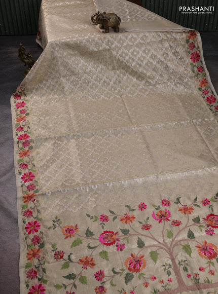 Art tissue saree gold with allover zari woven brocade weaves and embroidery work border