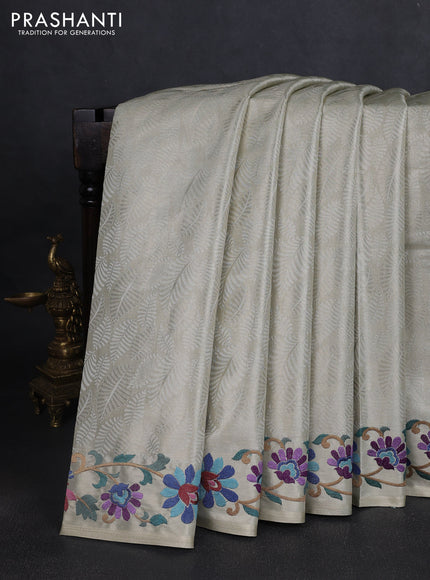 Art tissue saree beige with allover zari woven brocade weaves and embroidery work border