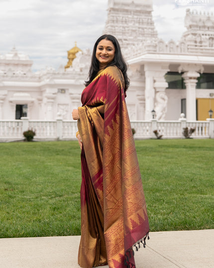 Pure kanchipuram silk saree maroon with plain body and rising temple border