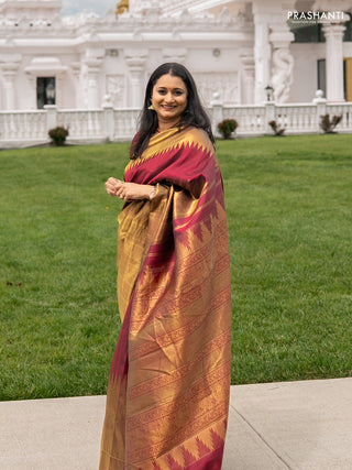 Pure kanchipuram silk saree maroon with plain body and rising temple border