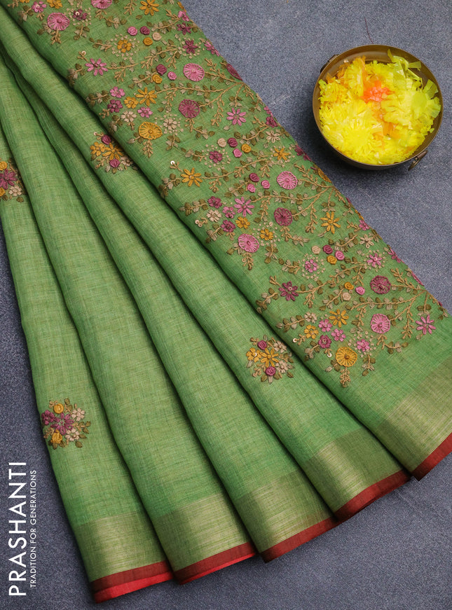 Linen cotton saree light green and maroon with embroidery buttas and zari woven border