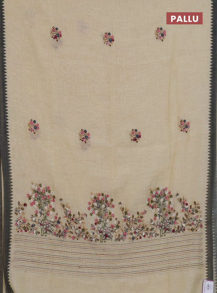 Linen cotton saree beige and black with embroidery buttas and printed border
