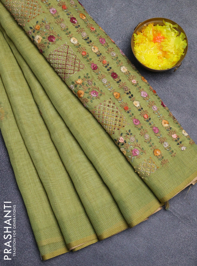 Linen cotton saree light green with embroidery buttas and printed border