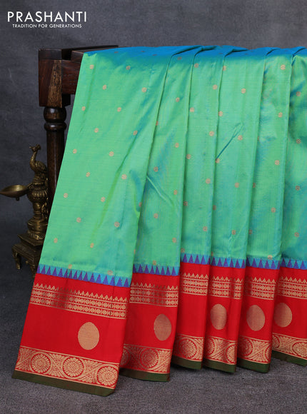 Narayanpet silk saree dual shade of teal green and red with allover zari woven buttas and temple design rettapet zari woven butta border