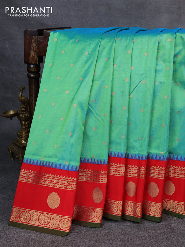 Narayanpet silk saree dual shade of teal green and red with allover zari woven buttas and temple design rettapet zari woven butta border