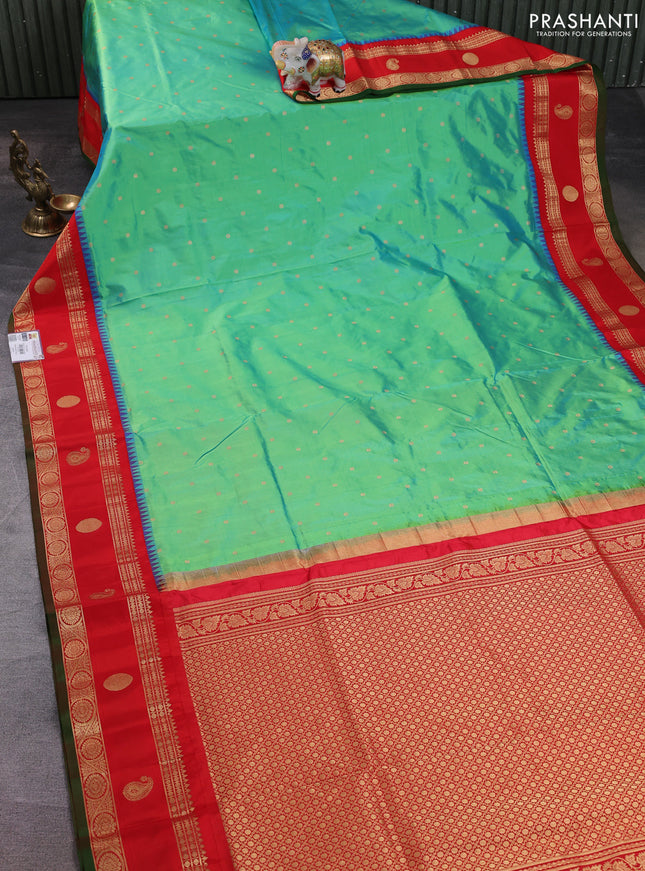 Narayanpet silk saree dual shade of teal green and red with allover zari woven buttas and temple design rettapet zari woven butta border