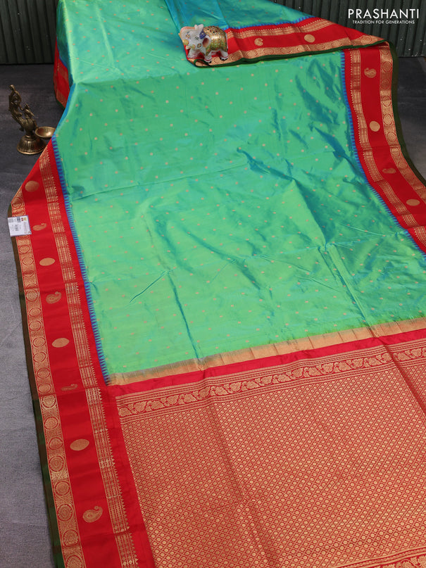 Narayanpet silk saree dual shade of teal green and red with allover zari woven buttas and temple design rettapet zari woven butta border