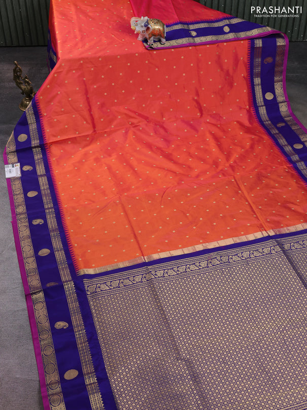 Narayanpet silk saree orange and navy blue with allover zari woven buttas and temple design rettapet zari woven butta border