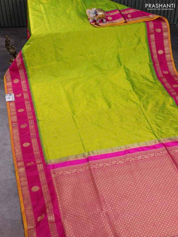 Narayanpet silk saree fluorescent green and pink with allover zari woven buttas and temple design rettapet zari woven butta border