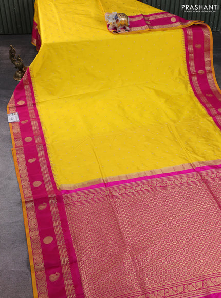 Narayanpet silk saree yellow and pink with allover zari woven buttas and temple design zari woven border