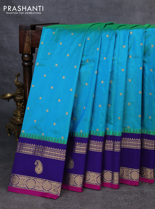 Narayanpet silk saree dual shade of bluish green and navy blue with allover zari woven buttas and temple design zari woven border