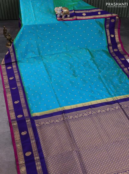 Narayanpet silk saree dual shade of bluish green and navy blue with allover zari woven buttas and temple design zari woven border