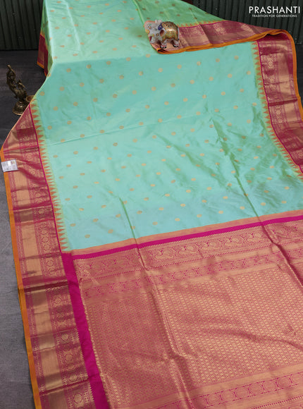 Narayanpet silk saree dual shade of teal green and pink with allover zari woven buttas and temple design zari woven border