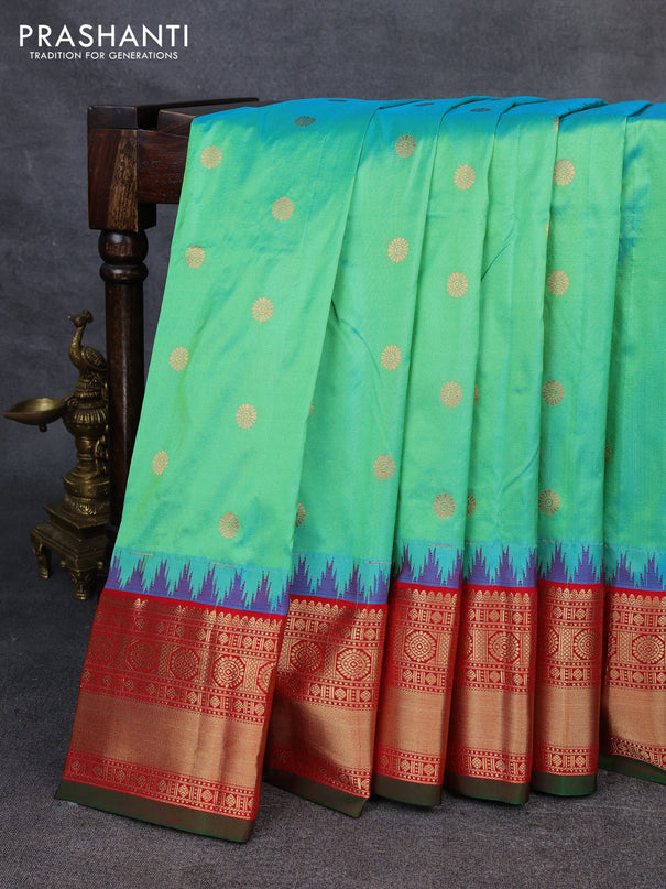 Narayanpet silk saree dual shade of teal green and red with allover zari woven buttas and temple design zari woven border