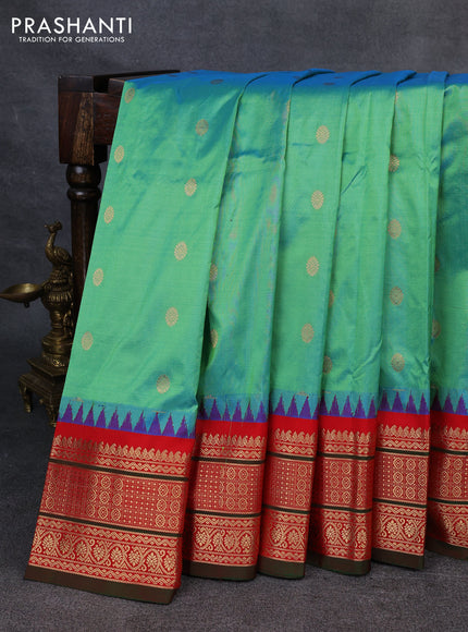 Narayanpet silk saree dual shade of green and red with allover zari woven buttas and temple design zari woven border