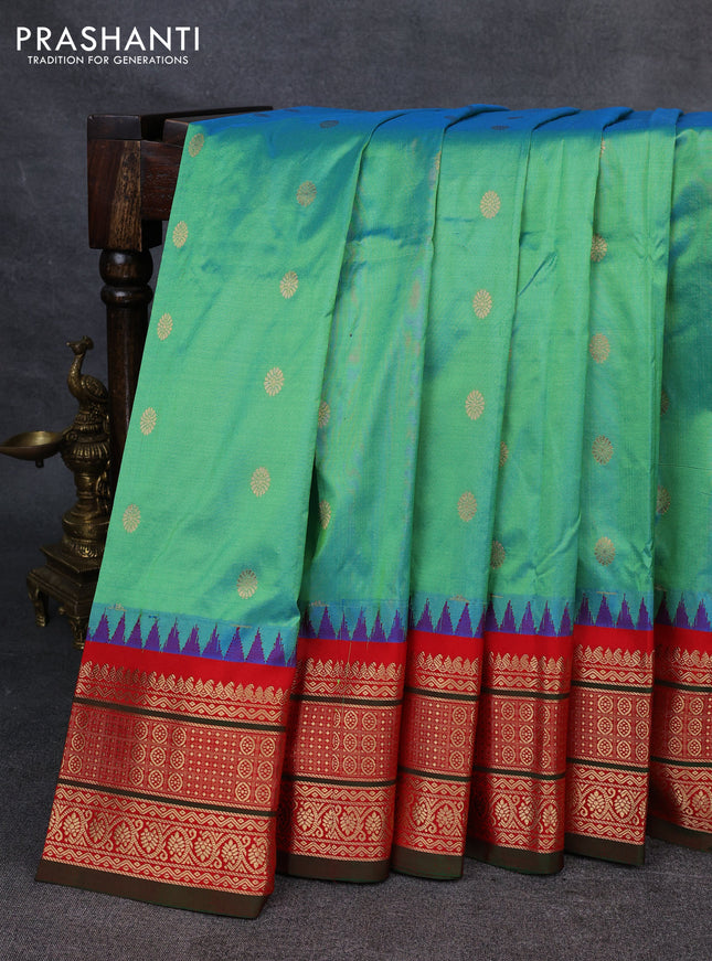 Narayanpet silk saree dual shade of green and red with allover zari woven buttas and temple design zari woven border