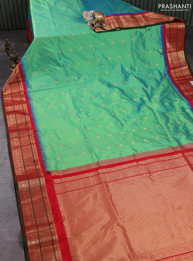 Narayanpet silk saree dual shade of green and red with allover zari woven buttas and temple design zari woven border