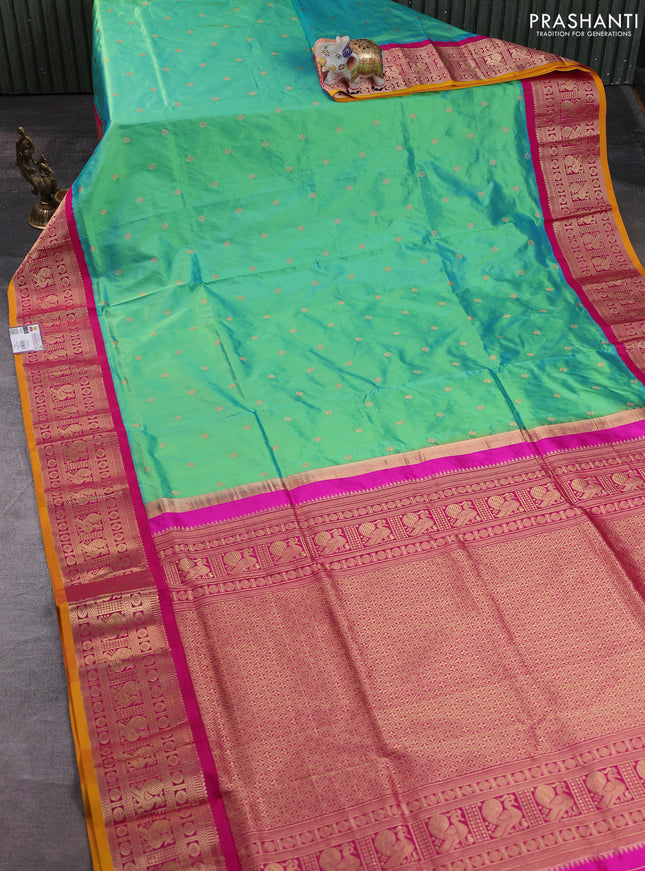 Narayanpet silk saree dual shade of teal green and pink with allover zari woven buttas and zari woven korvai border