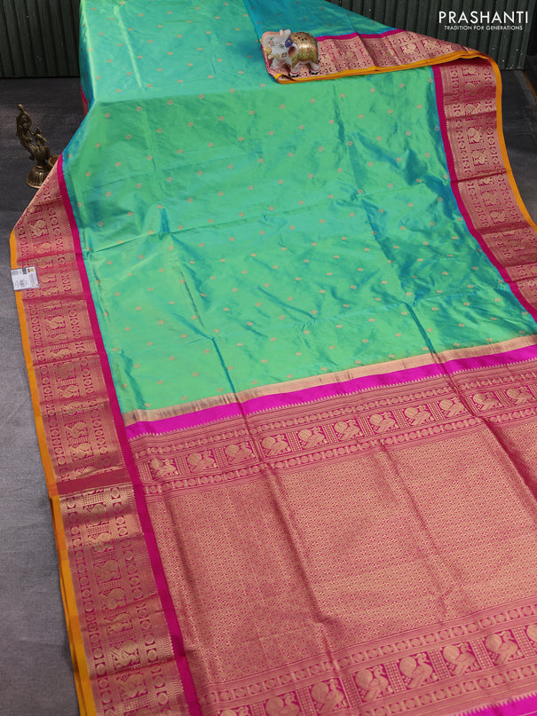 Narayanpet silk saree dual shade of teal green and pink with allover zari woven buttas and zari woven korvai border