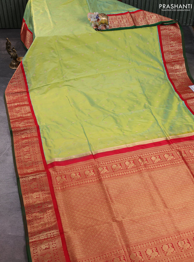 Narayanpet silk saree fluorescent green and red with allover zari woven buttas and zari woven korvai border