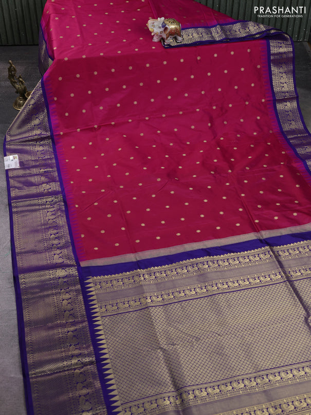 Narayanpet silk saree tomato pink and dark blue with allover zari woven buttas and temple design long zari woven border