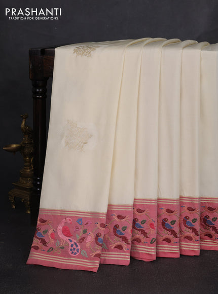 Art tussar silk saree cream and red shade with zari woven buttas and zari woven embroidery work border