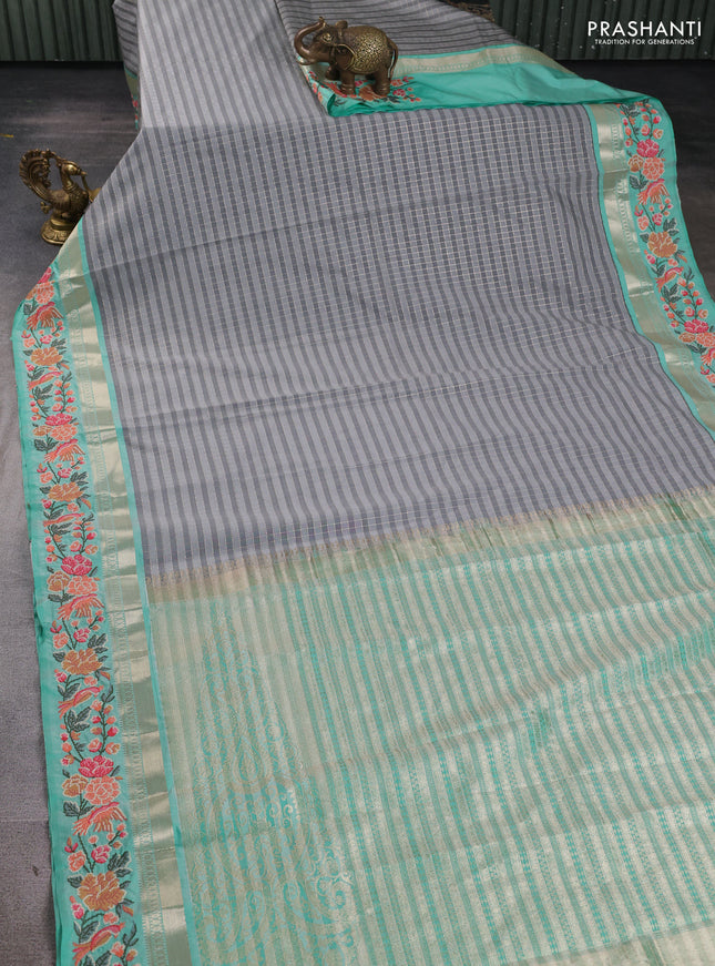 Tussar silk saree grey and teal green with allover zari checks & buttas and zari woven embroidery work border