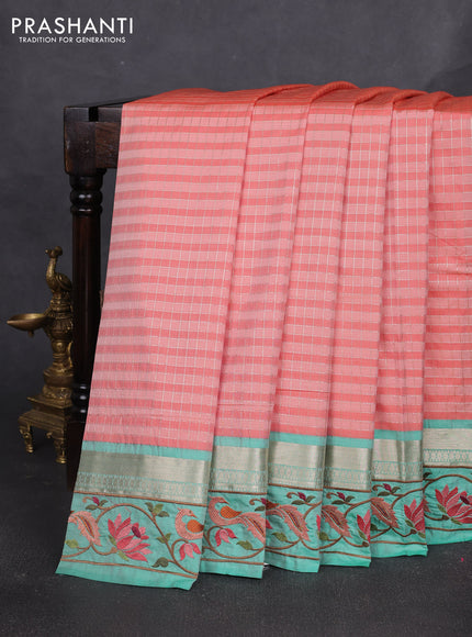 Art tussar silk saree peach shade and teal green with allover zari ckecked pattern and zari woven embroidery work border