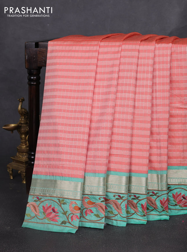Tussar silk saree peach shade and teal green with allover zari ckecked pattern and zari woven embroidery work border