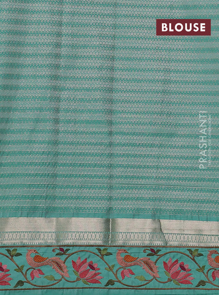 Art tussar silk saree peach shade and teal green with allover zari ckecked pattern and zari woven embroidery work border