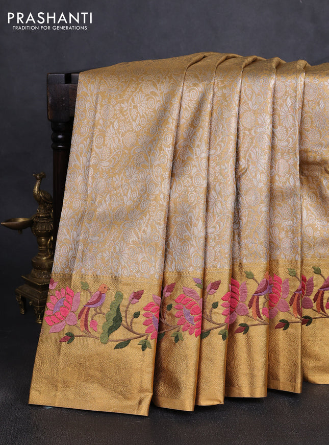 Tissue silk sare gold with allover brocade weaves and embroidery work border